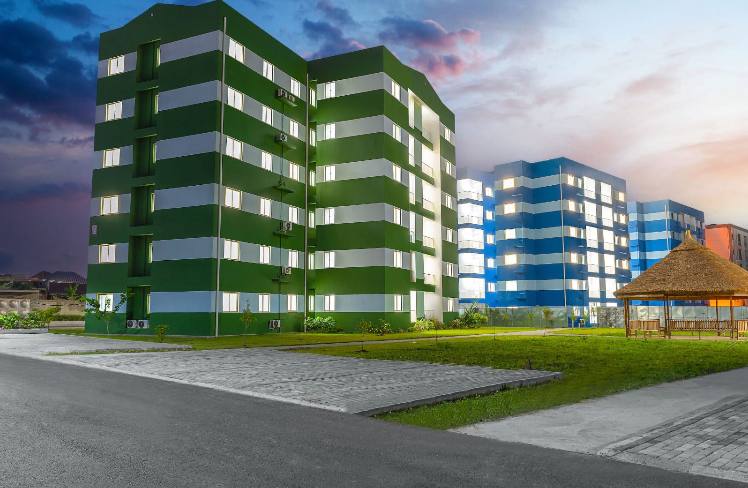 A large building with a large building behind it