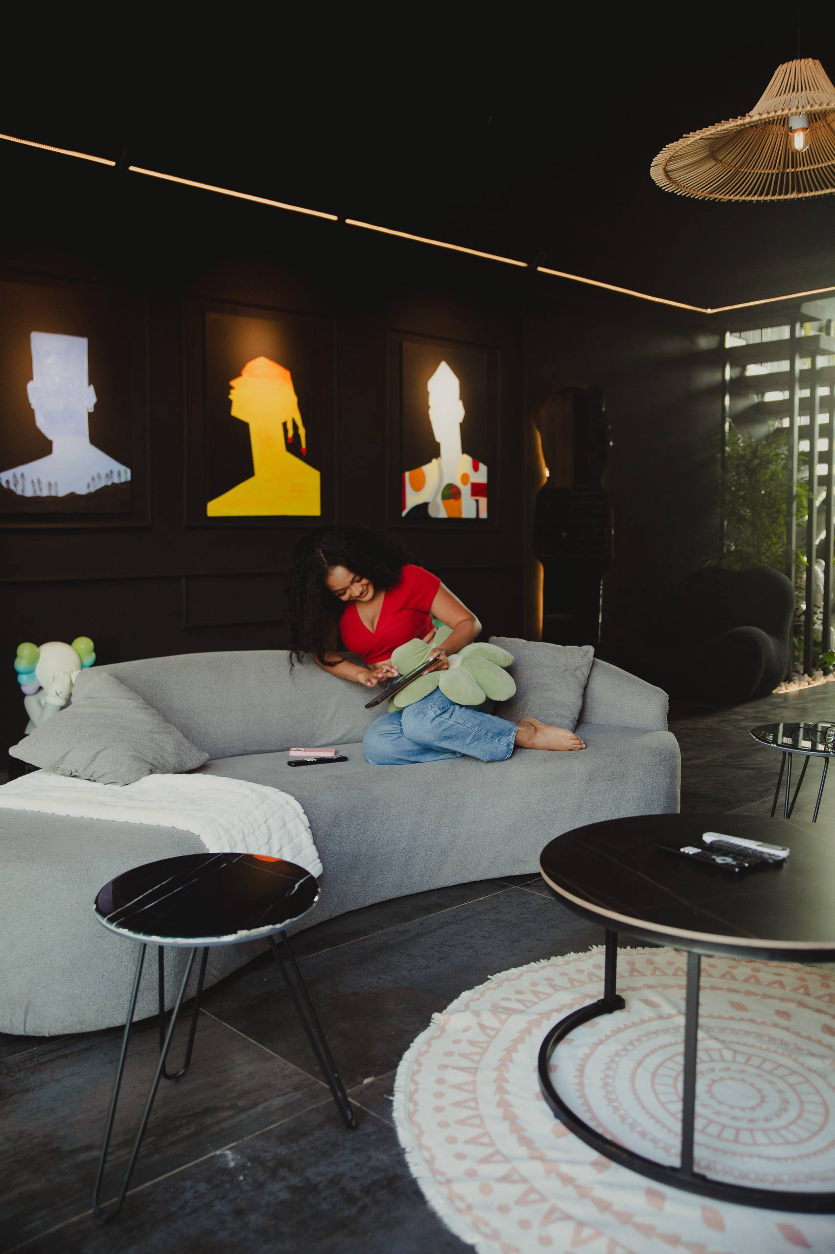 A person sitting on a couch in a living room