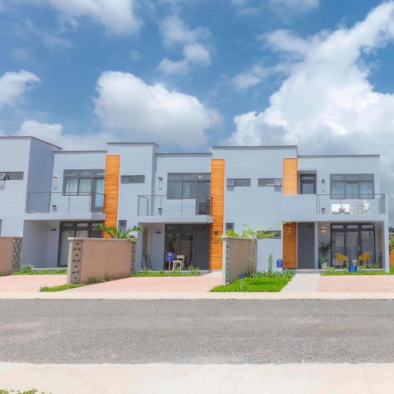 A building with a large building behind it